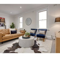 Large stylish and quiet penthouse steps from surf - Dalby Accommodation