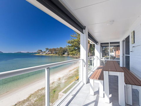 Sunrise Waters', 2/63 Soldiers Point Road - Stunning Waterfront Property - Dalby Accommodation 0