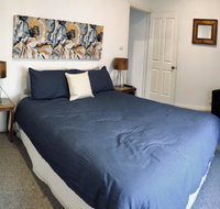 The Light and Bright Yellow Beach House - Dalby Accommodation